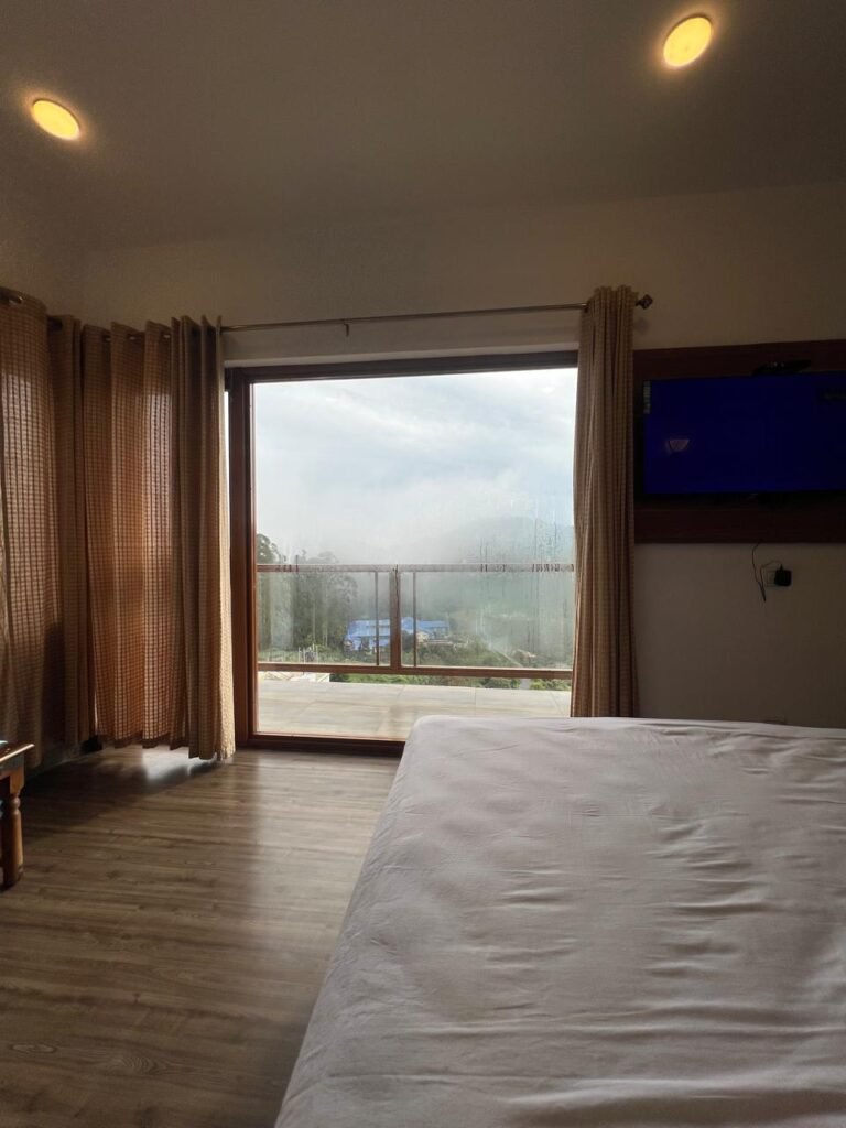 Room with balcony and view